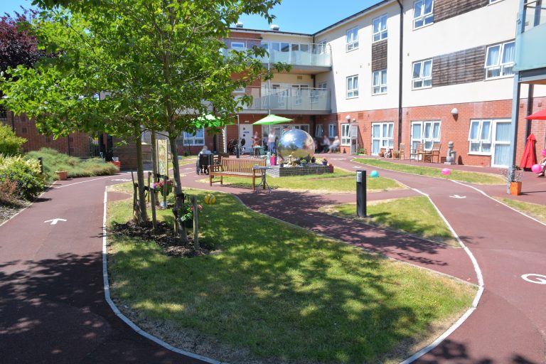 The rear garden and cycle path at Drovers House